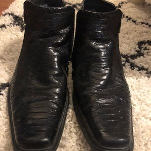 Snakeskin fleece lined ankle boots.